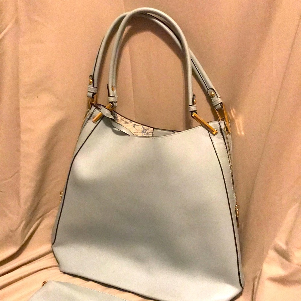 Ladies over the shoulder light blue leather purse